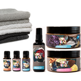 Image of face towels, Peace, Vital Spirit and Clarity Essential Oil Blends, Pure Rosewater Hydrating Toner, Concentrated Face Wash and Soft Clay Treatment on a white background