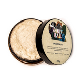 Top view of skin scrub with lid off the jar, revealing textured scrub product on white background